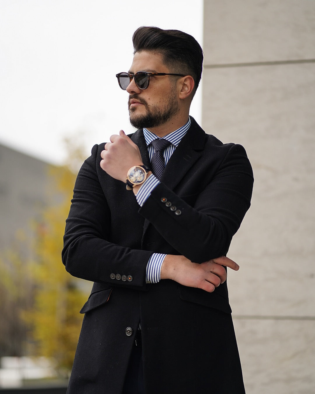 Radu Balgiu wearing a GEYA watch with a dark suit